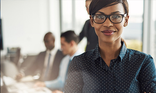 Woman with others behind her